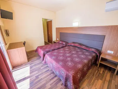 Cama o camas de una habitación en Hotel Golden Sand
