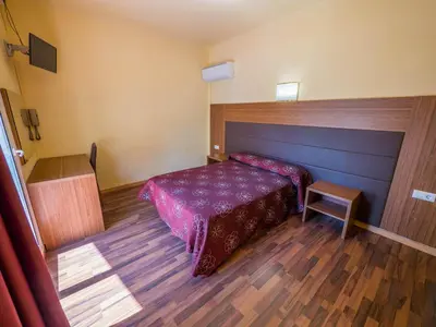 Cama o camas de una habitación en Hotel Golden Sand