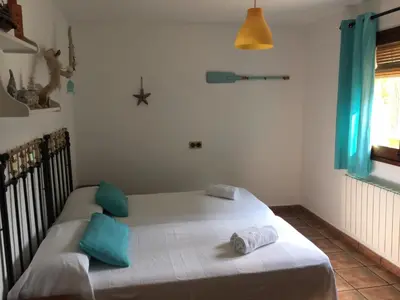 Cama o camas de una habitación en Can Cadiretes