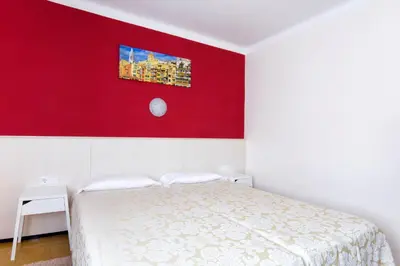 Cama o camas de una habitación en Hostal Fabrellas