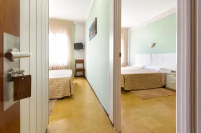 Cama o camas de una habitación en Hostal Fabrellas