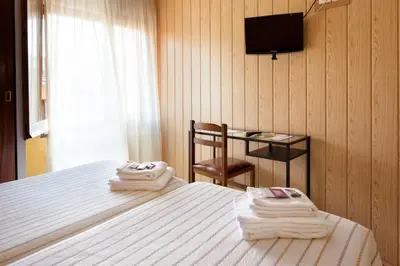 Cama o camas de una habitación en Hostal Fabrellas