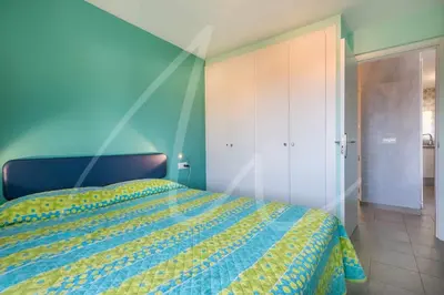 Cama o camas de una habitación en Carabela by SeaMount Rentals