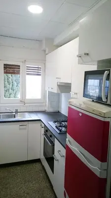 Una cocina o zona de cocina en Apartamentos Juan Jose
