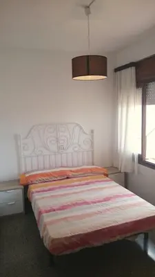 Cama o camas de una habitación en Apartamentos Juan Jose