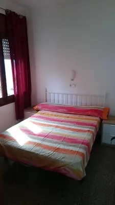 Cama o camas de una habitación en Apartamentos Juan Jose