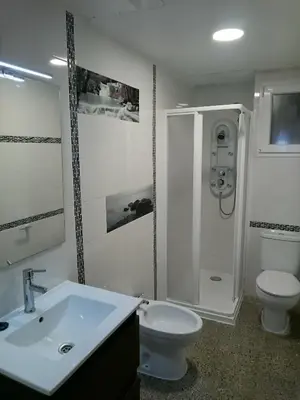 Un baño de Apartamentos Juan Jose