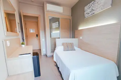 Cama o camas de una habitación en Hotel S'Agoita