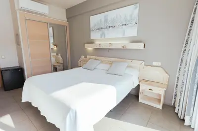 Cama o camas de una habitación en Hotel S'Agoita