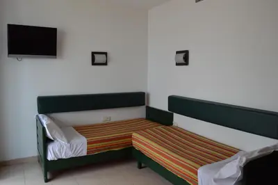 Cama o camas de una habitación en Apartaments Rosanna