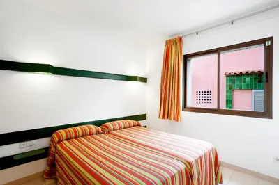 Cama o camas de una habitación en Apartaments Rosanna