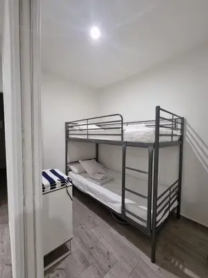 Cama o camas de una habitación en Apartamento Puerto Blanes