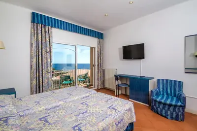 Cama o camas de una habitación en Hotel La Torre