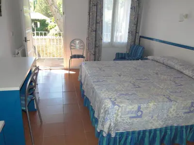 Cama o camas de una habitación en Hotel La Torre