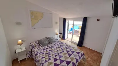 Cama o camas de una habitación en Ca la Pepa