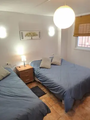 Cama o camas de una habitación en Ca la Pepa