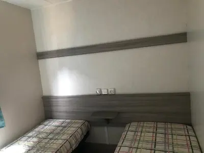 Cama o camas de una habitación en Camping Castell D'aro