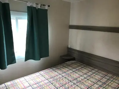 Cama o camas de una habitación en Camping Castell D'aro