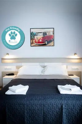 Cama o camas de una habitación en Apartamentos Comfort Calella