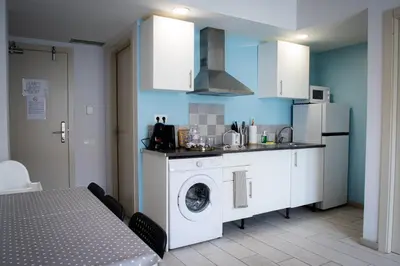 Una cocina o zona de cocina en Apartamentos Comfort Calella