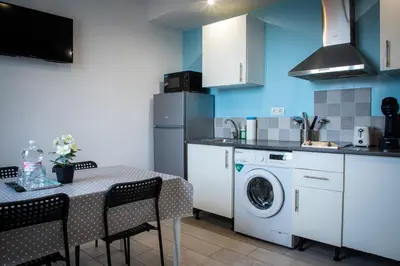 Una cocina o zona de cocina en Apartamentos Comfort Calella