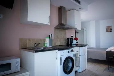 Una cocina o zona de cocina en Apartamentos Comfort Calella