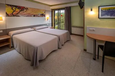 Cama o camas de una habitación en Hotel Sabiote