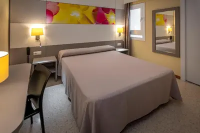 Cama o camas de una habitación en Hotel Sabiote