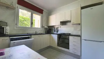 Una cocina o zona de cocina en Villa Pals Carles Piscina
