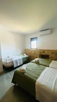 Cama o camas de una habitación en Can Serrà 1786