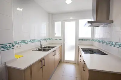 Una cocina o zona de cocina en Apartamentos Blanes-Condal Costa Brava