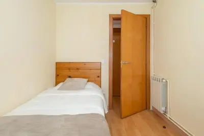 Cama o camas de una habitación en Apartamento céntrico en Girona