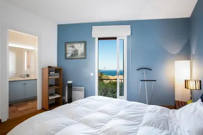 Cama o camas de una habitación en La Caleta
