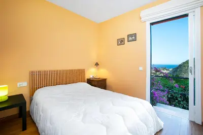 Cama o camas de una habitación en La Caleta