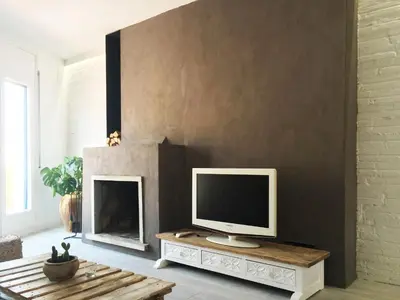 Una televisión o centro de entretenimiento en Casa Dolce Vita