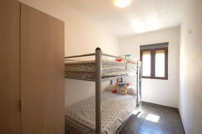 Cama o camas de una habitación en Lets Holidays COZY APARTMENT 70 m. from THE BEACH in TOSSA
