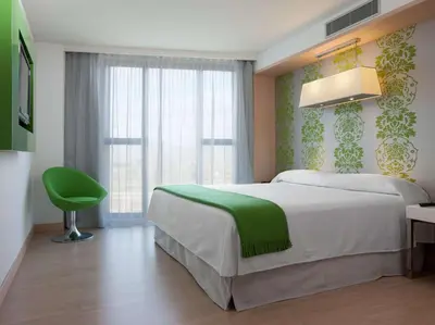 Cama o camas de una habitación en DoubleTree by Hilton Girona