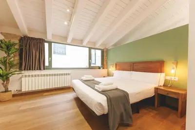 Cama o camas de una habitación en Bravissimo Força 17, Barri Vell apartments