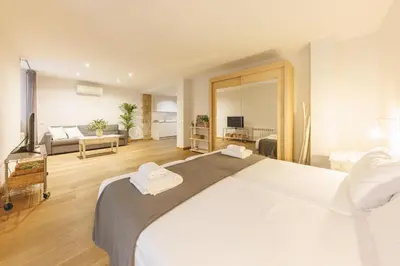 Cama o camas de una habitación en Bravissimo Força 17, Barri Vell apartments