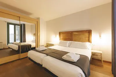 Cama o camas de una habitación en Bravissimo Força 17, Barri Vell apartments