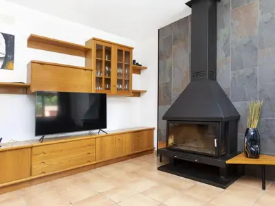 Una televisión o centro de entretenimiento en Holiday Home Montverde by Interhome