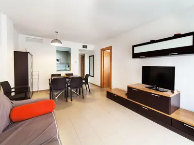 Una televisión o centro de entretenimiento en Apartment Marcela by Interhome