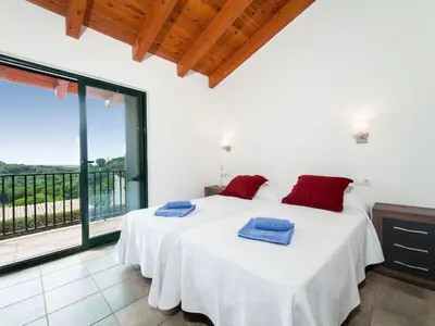 Cama o camas de una habitación en Holiday Home Toscana by Interhome