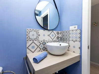 Un baño de Apartment Lotus by Interhome