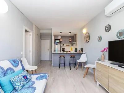 Una televisión o centro de entretenimiento en Apartment Lotus by Interhome