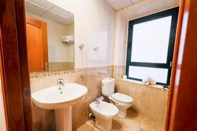 Un baño de Apartamentos Royal