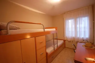 Cama o camas de una habitación en Lets Holidays Centric Apartment in Tossa de Mar