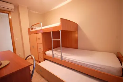 Cama o camas de una habitación en Lets Holidays Centric Apartment in Tossa de Mar