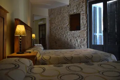 Cama o camas de una habitación en Casa Cundaro