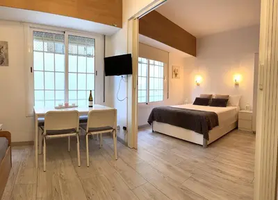 Cama o camas de una habitación en Lets Holidays Comfortable Apartment Near Beach